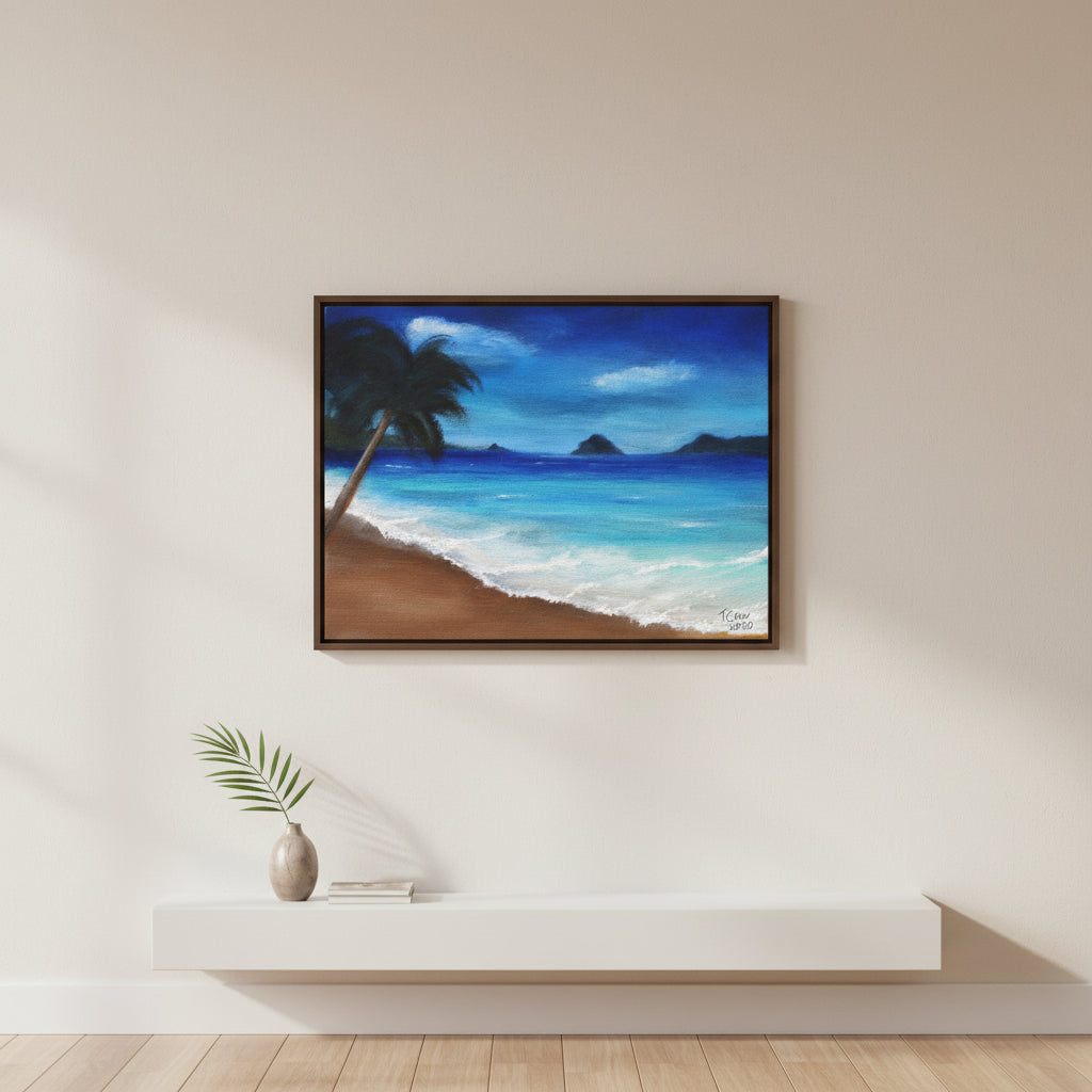 Framed painting of a tropical beach scene on a wall above a white console table.